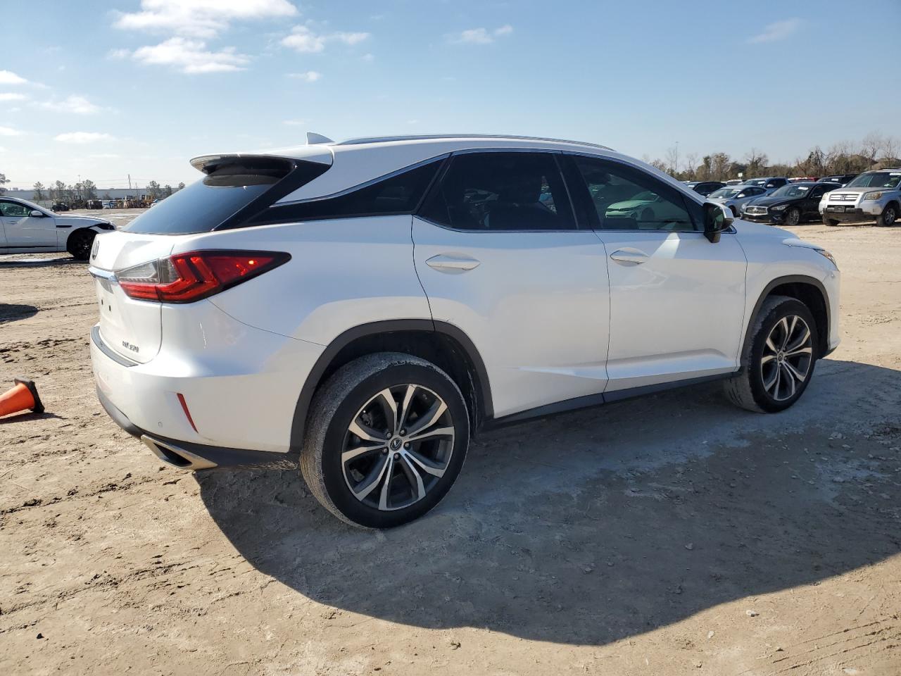 2019 Lexus RX VIN 2T2ZZMCA0KC144774 Copart auction photo, side / minor dent/scratches damage thumbnail 3