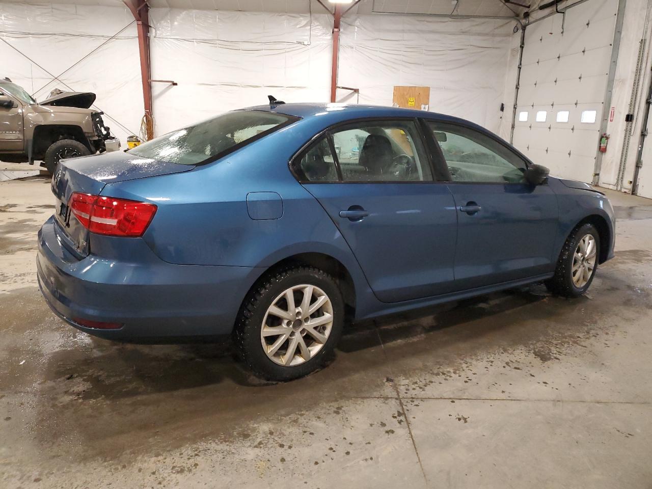 2015 Volkswagen Jetta VIN 3VWD17AJ5FM418975 Copart auction photo, side / front end damage thumbnail 3