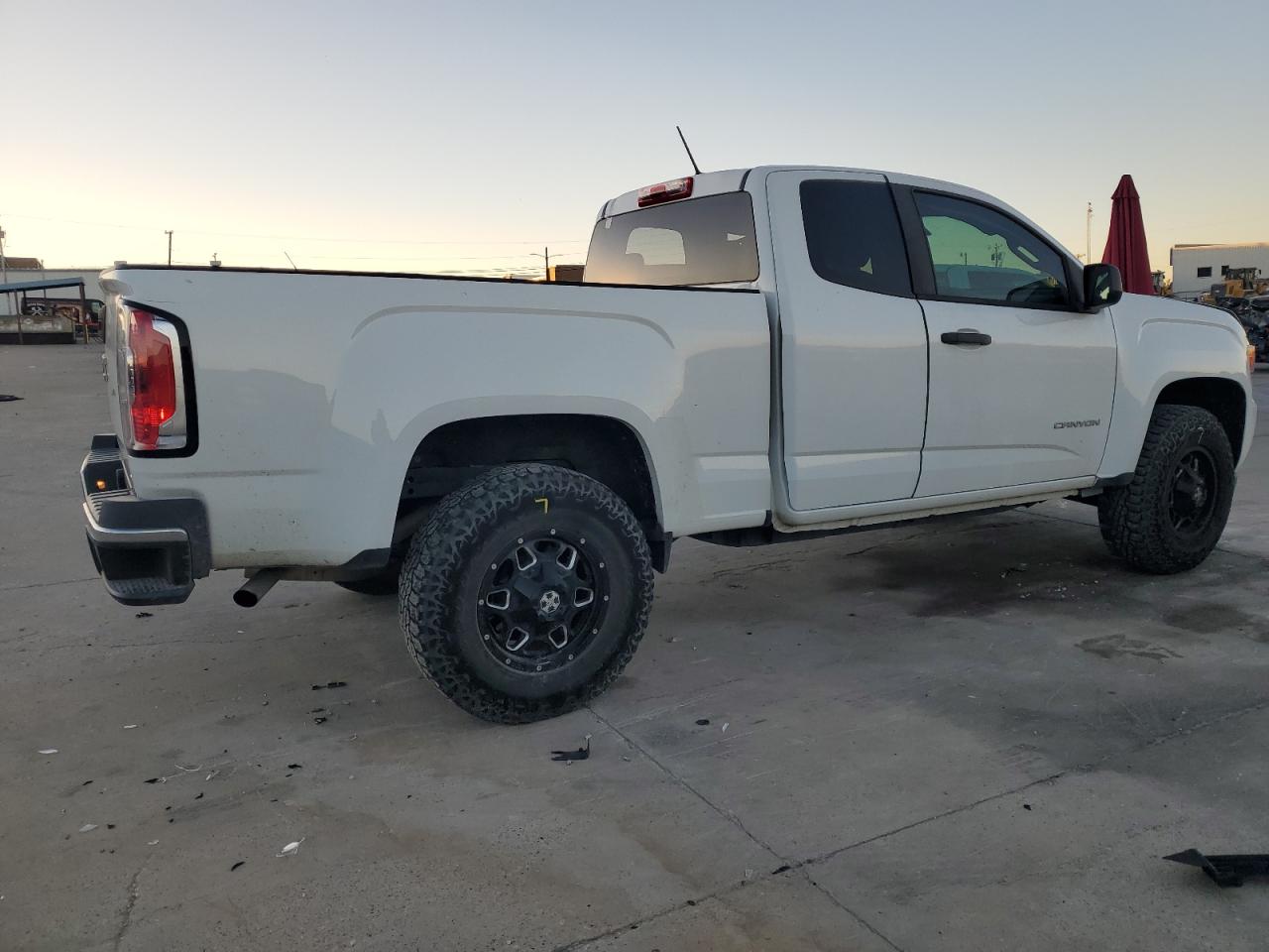 2018 GMC Canyon VIN 1GTH5BEA4J1107033 Copart auction photo, side / front end damage thumbnail 3