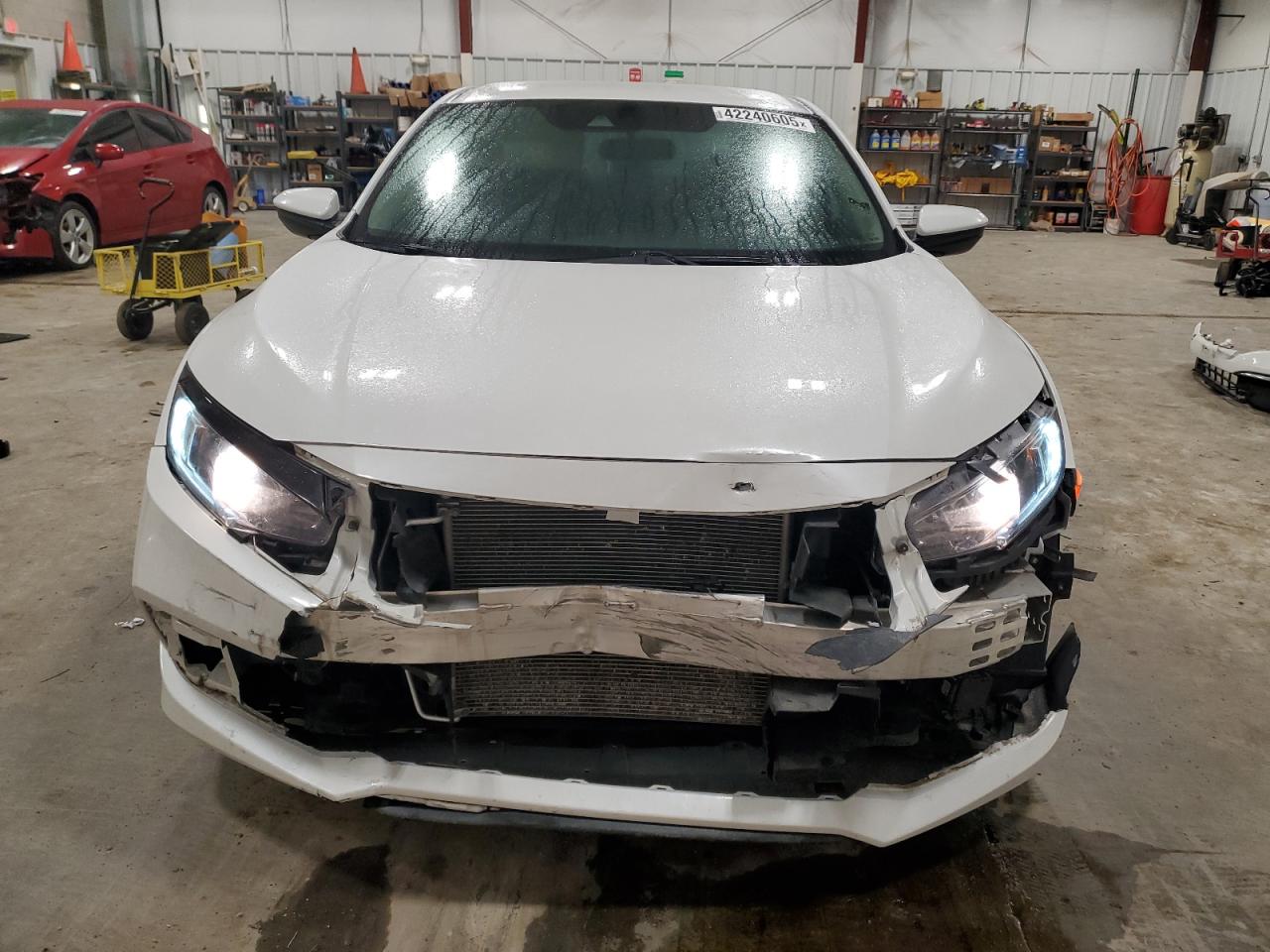 2019 Honda Civic VIN 2HGFC2F69KH585282 Copart auction photo, front end / minor dent/scratches damage thumbnail 5