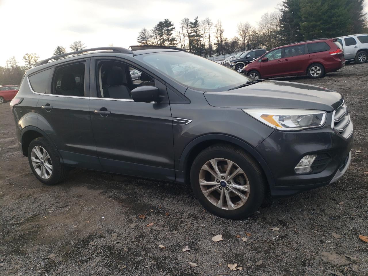 2018 Ford Escape VIN 1FMCU0GD7JUB62045 Copart auction photo, vandalism / minor dent/scratches damage thumbnail 4