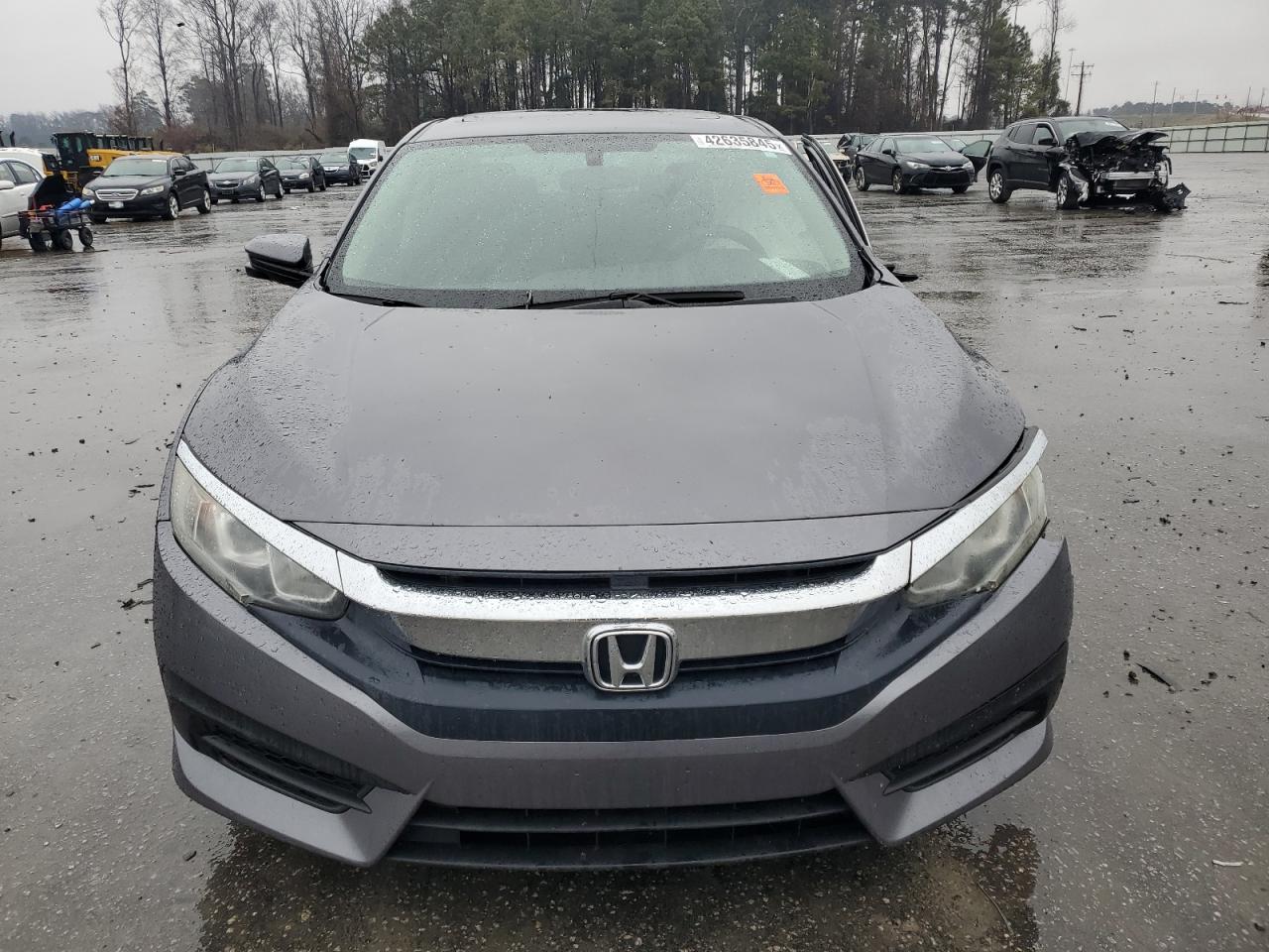 2017 Honda Civic VIN 19XFC2F70HE018518 Copart auction photo, all over / undercarriage damage thumbnail 5