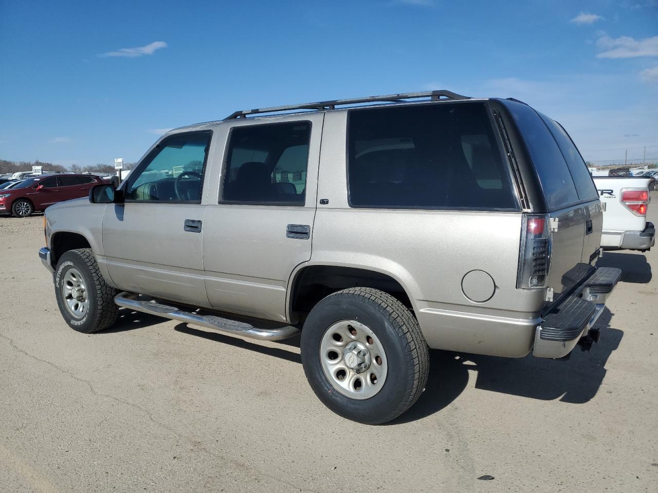 1999 Chevrolet Tahoe VIN 1GNEK13R4XJ458295 Copart auction photo, front end damage thumbnail 2