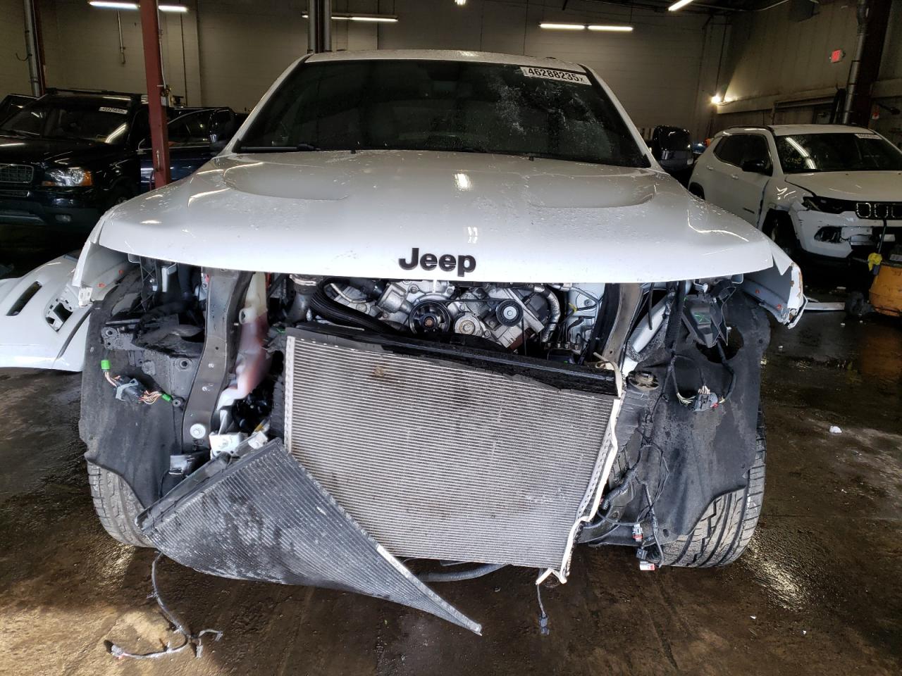 2020 Jeep Grand Cherokee VIN 1C4RJFBT8LC185531 Copart auction photo, front end / minor dent/scratches damage thumbnail 5