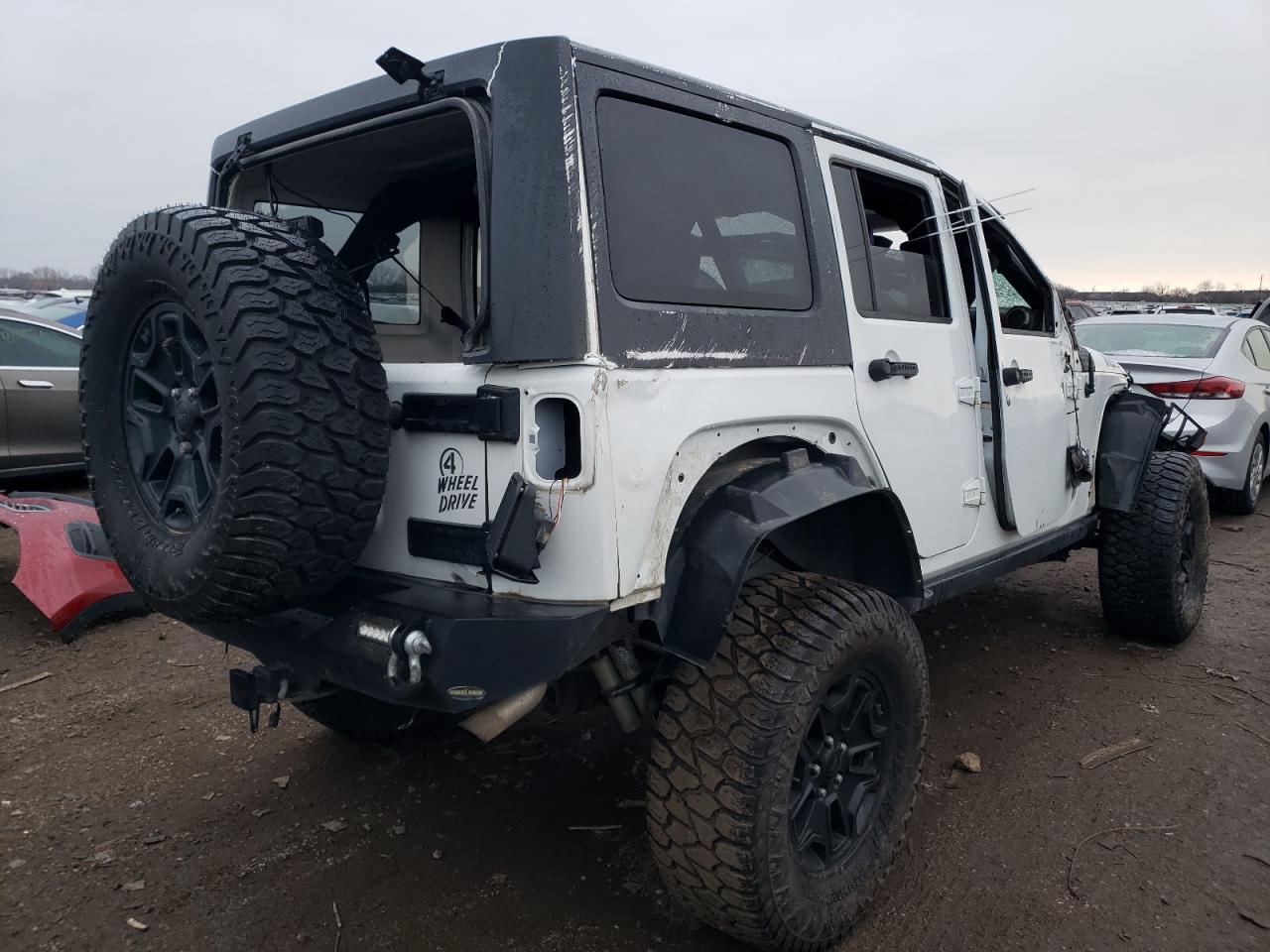 2016 Jeep Wrangler VIN 1C4BJWDG0GL302946 Copart auction photo, all over damage thumbnail 3