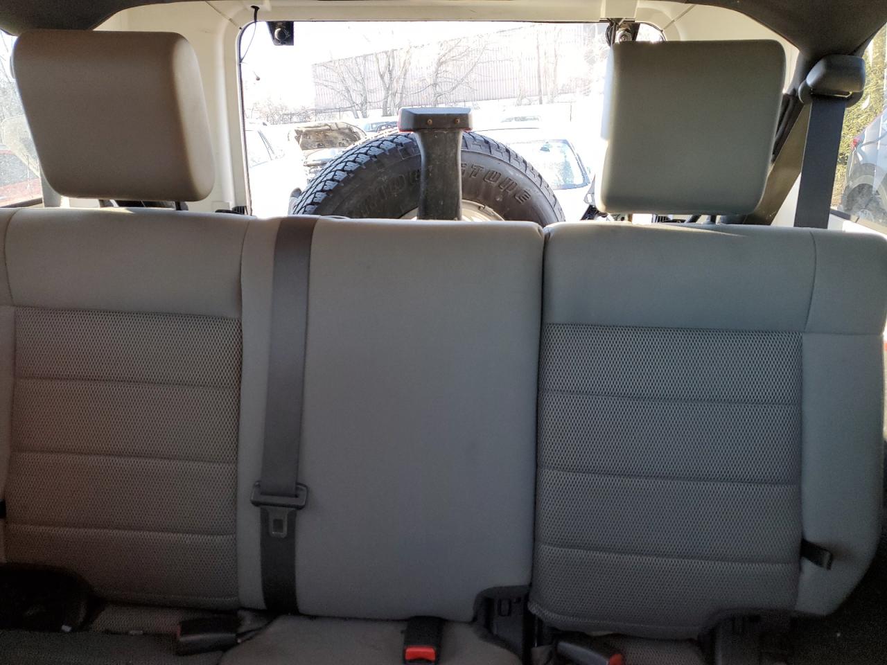 2008 Jeep Wrangler VIN 1J8GA591X8L604713 Copart auction photo, rear end damage thumbnail 10
