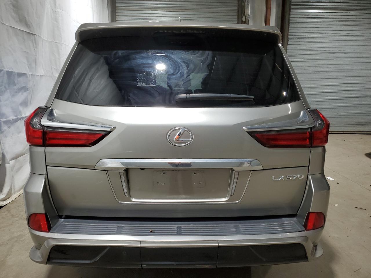 2021 Lexus LX VIN JTJDY7AX8M4338661 Copart auction photo, front end / side damage thumbnail 6