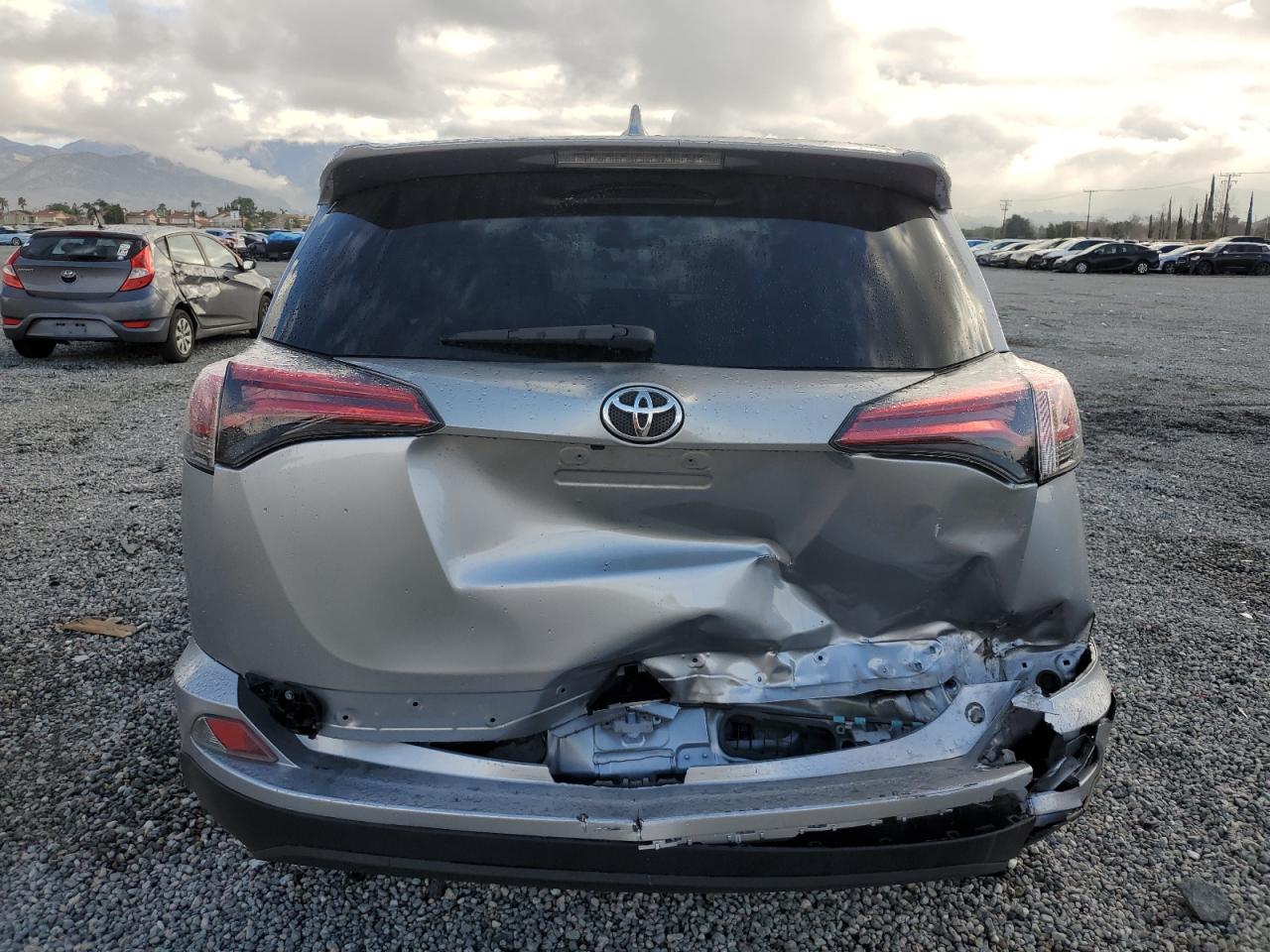 2018 Toyota RAV 4 VIN 2T3ZFREV1JW406266 Copart auction photo, rear end damage thumbnail 6