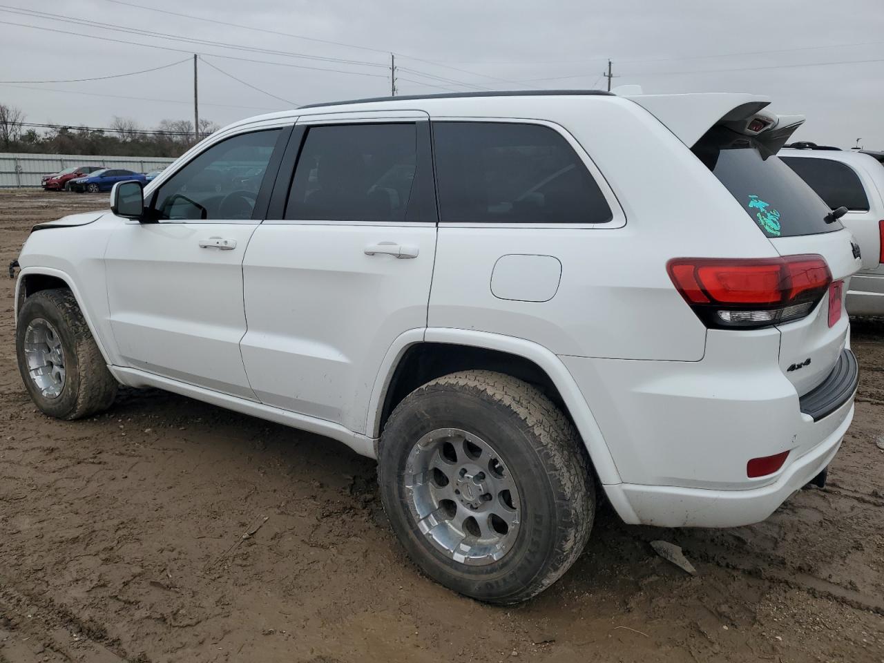 2015 Jeep Grand Cherokee VIN 1C4RJFAG1FC103082 Copart auction photo, front end / minor dent/scratches damage thumbnail 2