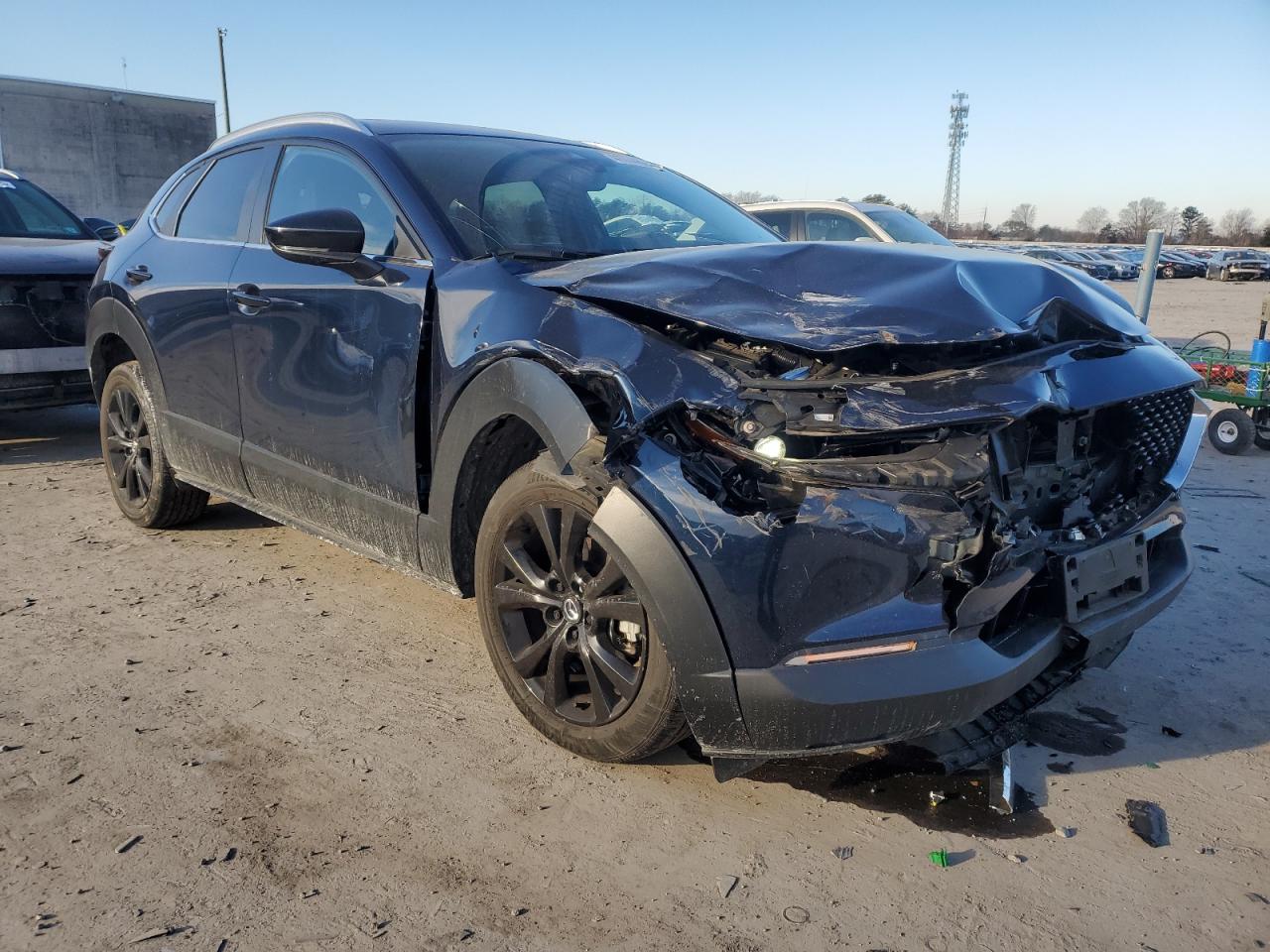 2021 Mazda CX-30 VIN 3MVDMBAYXMM313578 Copart auction photo, front end / minor dent/scratches damage thumbnail 4