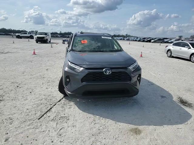 2022 Toyota RAV 4 VIN JTMB6RFV8ND078749 Copart auction photo, side damage thumbnail 12