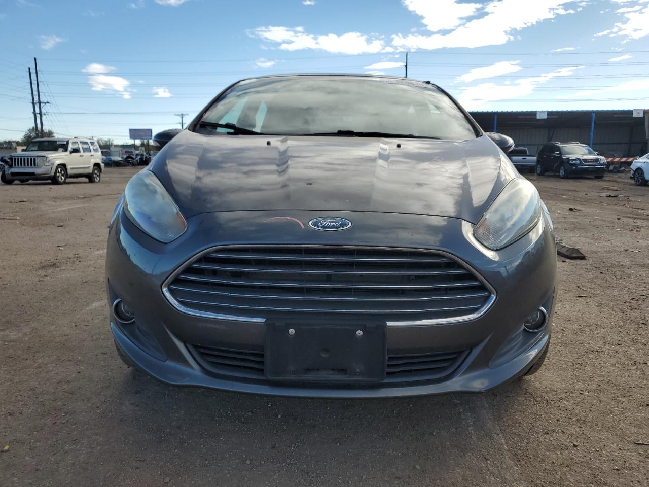 2016 Ford Fiesta VIN 3FADP4EJ7GM199650 Copart auction photo, rear end / hail damage thumbnail 5