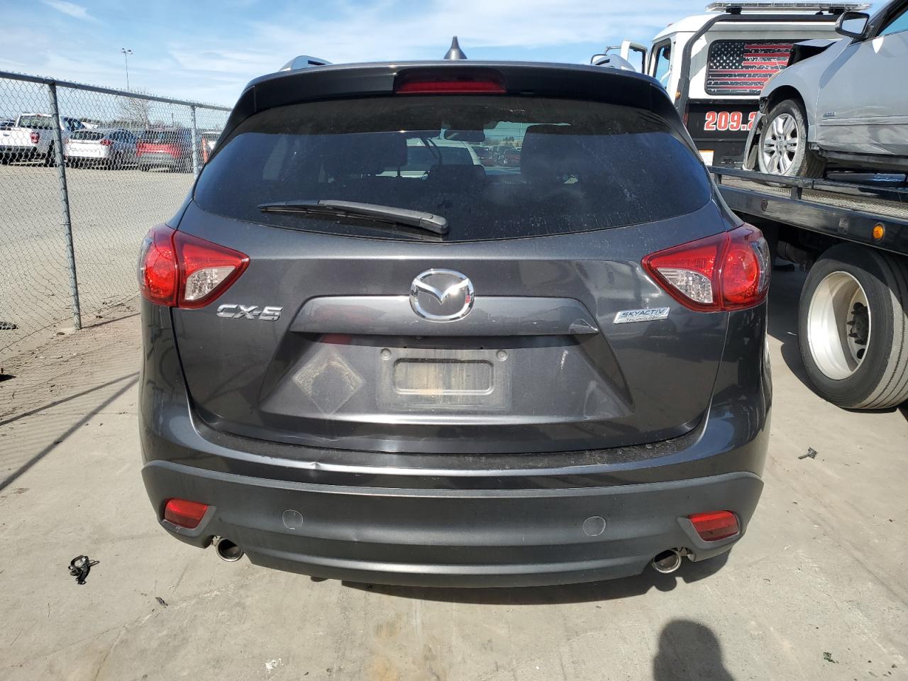 2016 Mazda CX-5 VIN JM3KE2CY7G0794391 Copart auction photo, front end / side damage thumbnail 6