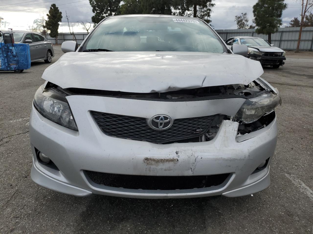 2010 Toyota Corolla VIN 1NXBU4EE8AZ308998 Copart auction photo, front end / side damage thumbnail 5