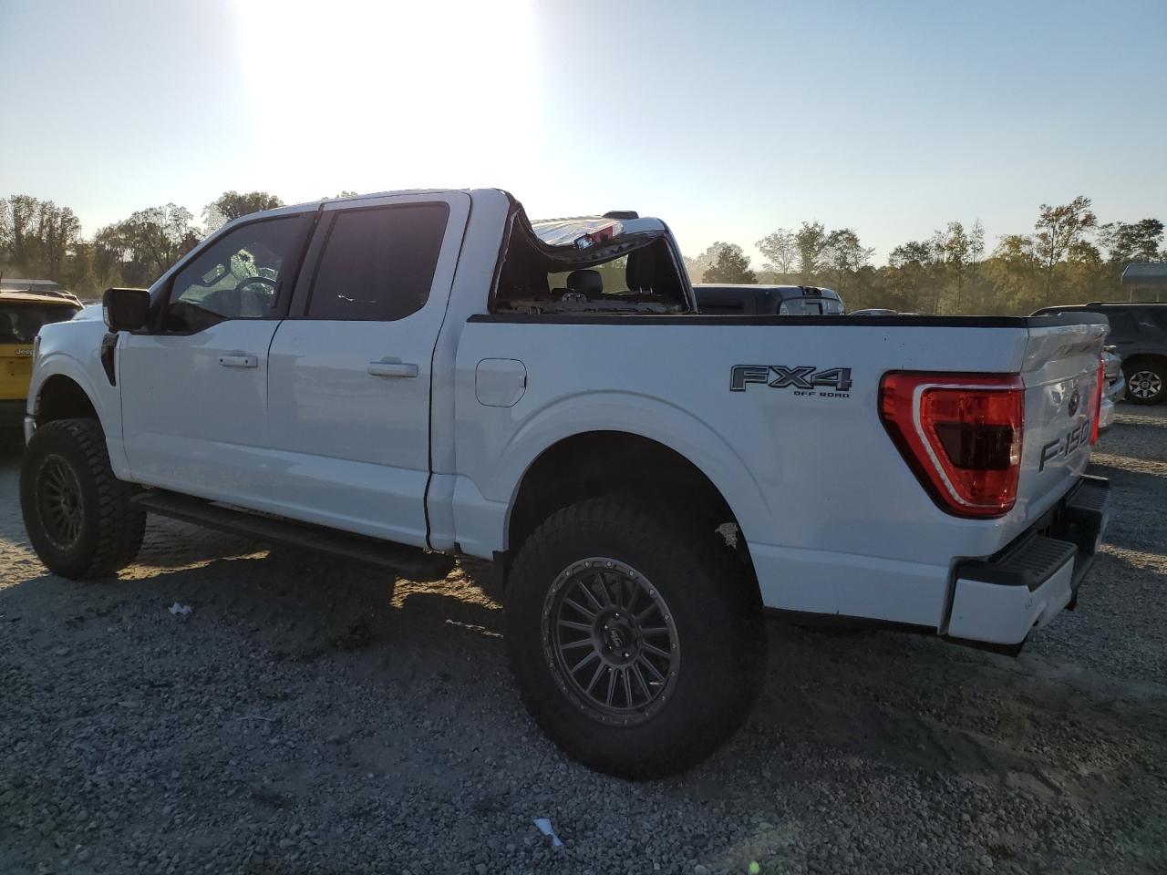 2023 Ford F-150 VIN 1FTFW1E56PFA81970 Copart auction photo, top/roof damage thumbnail 2