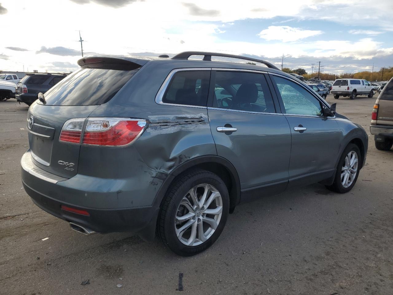 2011 Mazda CX-9 VIN JM3TB3DV4B0313416 Copart auction photo, side / rear end damage thumbnail 3