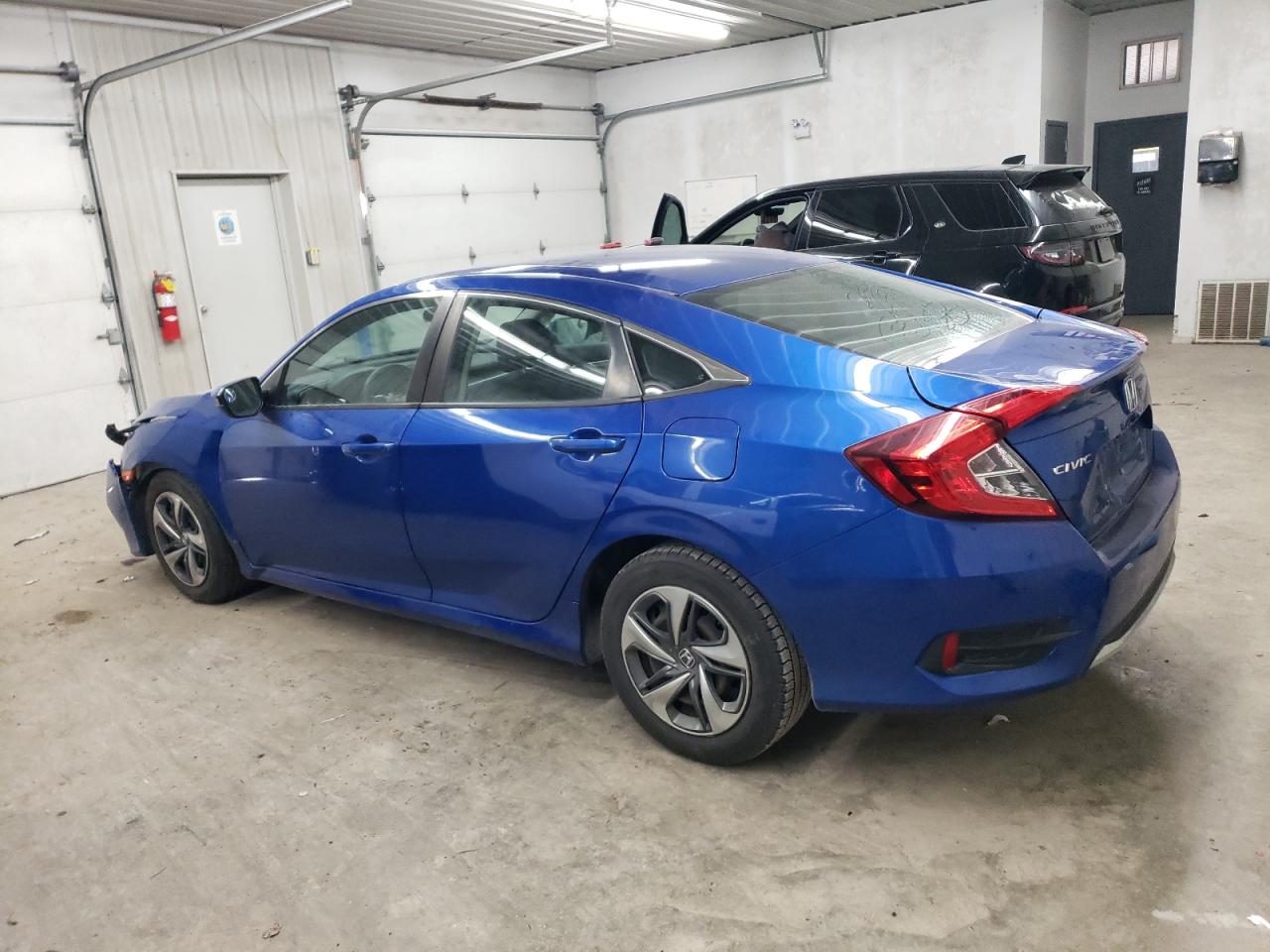 2019 Honda Civic VIN 2HGFC2F65KH561030 Copart auction photo, front end / minor dent/scratches damage thumbnail 2
