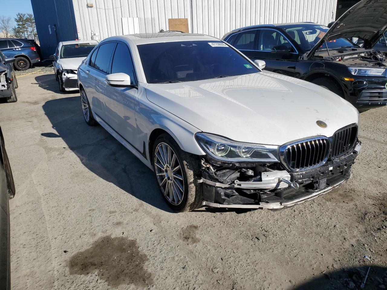 2017 BMW 7er VIN WBA7F2C55HG421809 Copart auction photo, front end damage thumbnail 4