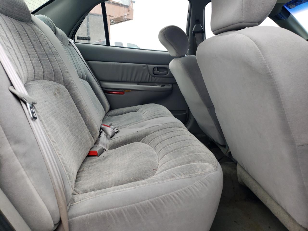 1999 Buick Century VIN 2G4WS52M6X1619469 Copart auction photo, all over damage thumbnail 11
