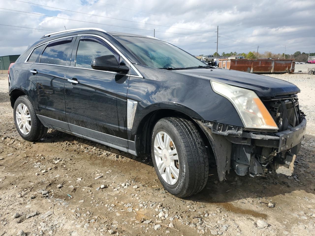 2015 Cadillac SRX VIN 3GYFNBE39FS531932 Copart auction photo, rear end / front end damage thumbnail 4