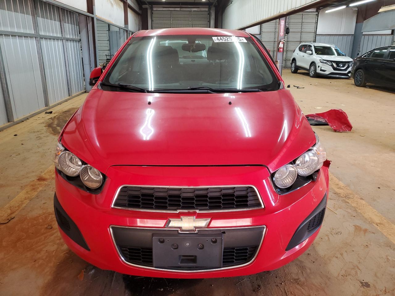 2016 Chevrolet Sonic VIN 1G1JC5SH3G4173096 Copart auction photo, side / front end damage thumbnail 5