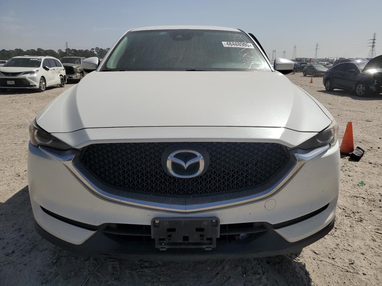 2017 Mazda CX-5 VIN JM3KFABLXH0183141 Copart auction photo, side / minor dent/scratches damage thumbnail 5