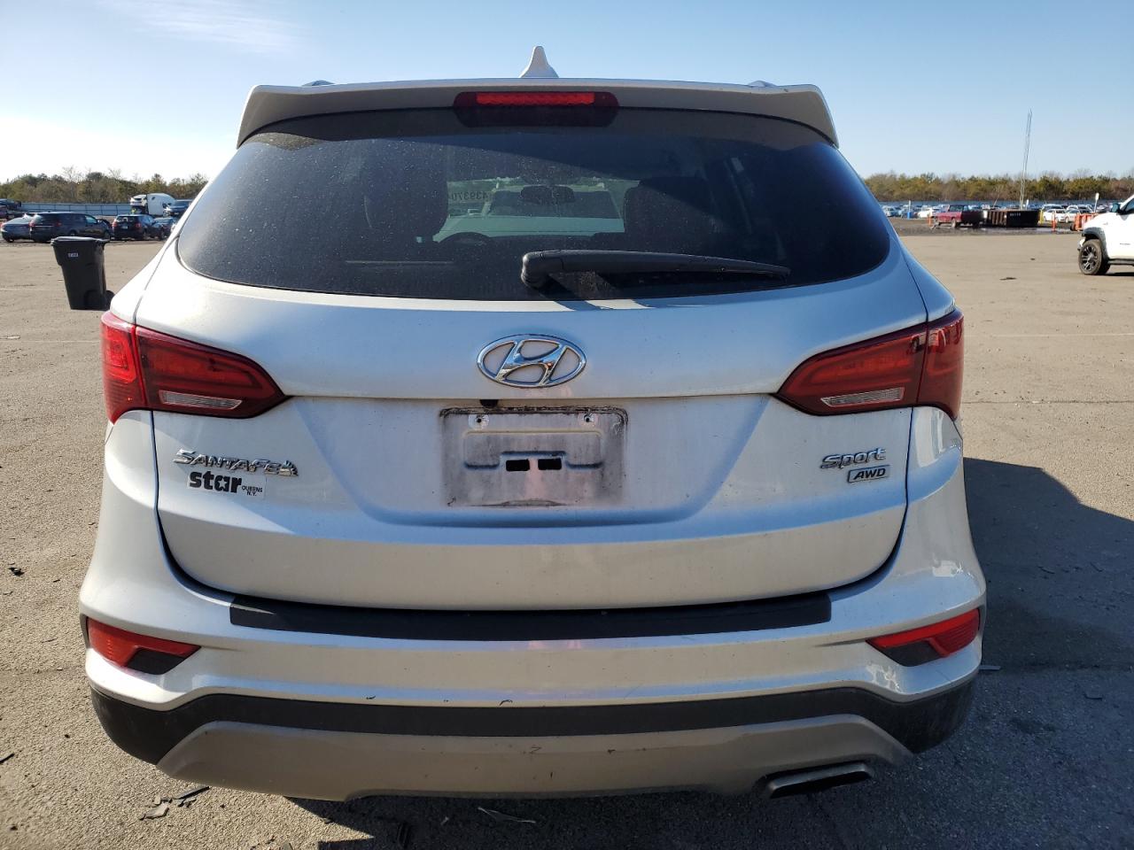 2018 Hyundai Santa Fe VIN 5XYZUDLB8JG532723 Copart auction photo, front end / minor dent/scratches damage thumbnail 6