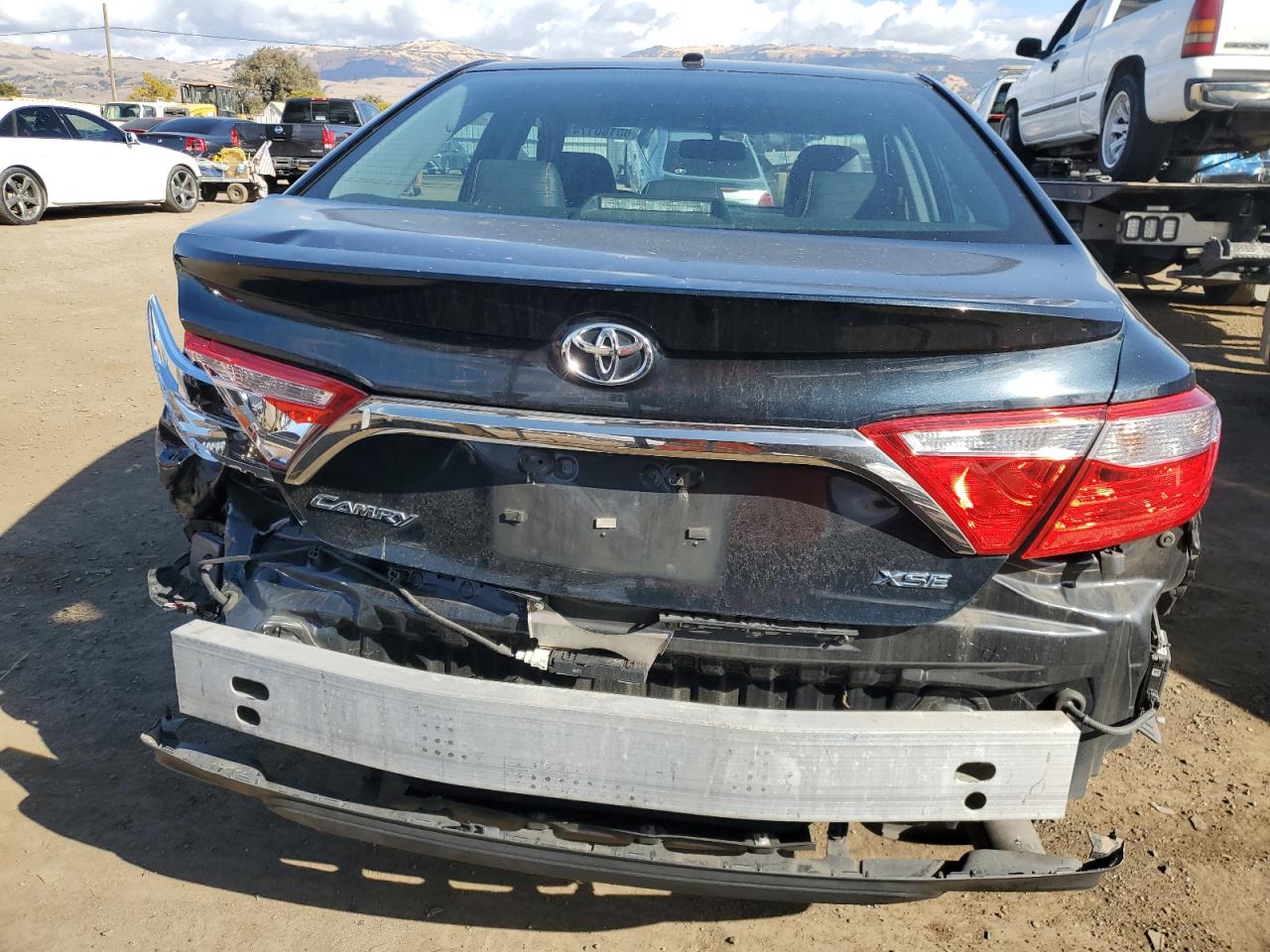 2015 Toyota Camry VIN 4T1BF1FK2FU879066 Copart auction photo, rear end damage thumbnail 6
