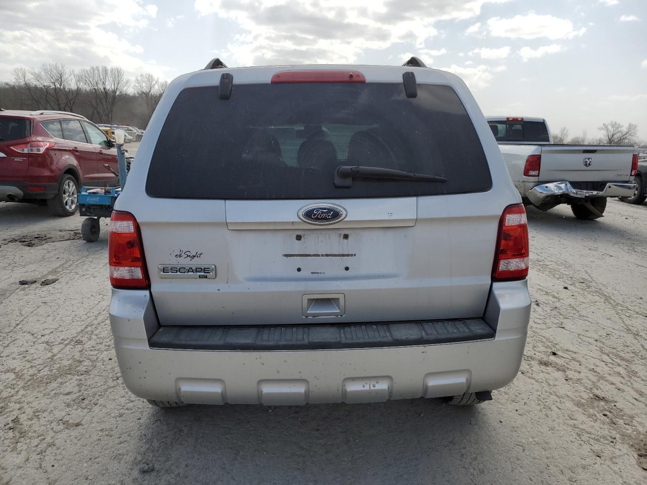 2010 Ford Escape VIN 1FMCU0D77AKB64145 Copart auction photo, side / front end damage thumbnail 6