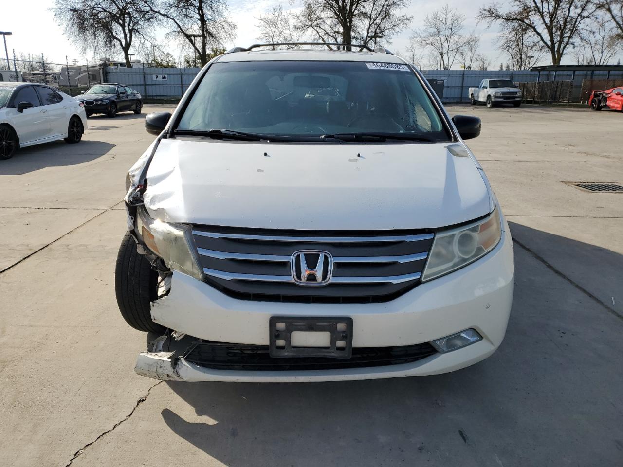 2012 Honda Odyssey VIN 5FNRL5H9XCB094604 Copart auction photo, front end / minor dent/scratches damage thumbnail 5