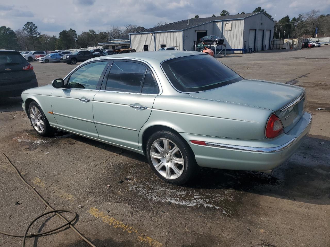 2004 Jaguar XJ VIN SAJWA71C94SG24466 Copart auction photo, side damage thumbnail 2