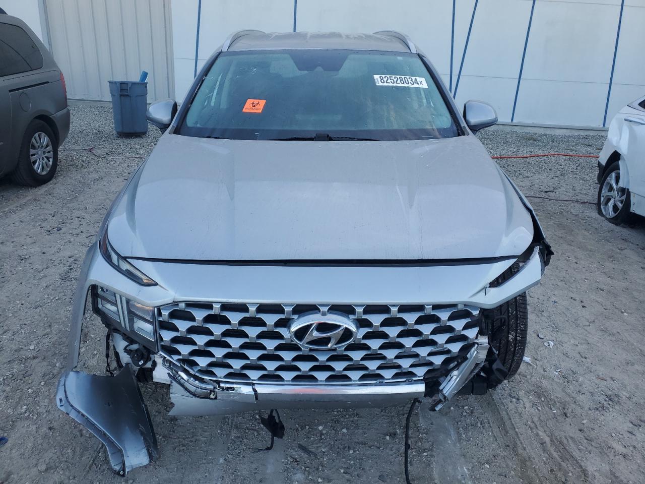 2021 Hyundai Santa Fe VIN 5NMS24AJ1MH323318 Copart auction photo, front end damage thumbnail 5