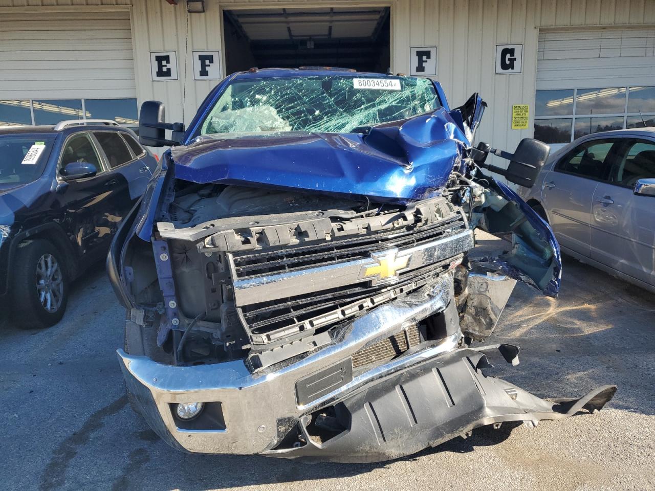 2015 Chevrolet Silverado VIN 1GC1KWE81FF161057 Copart auction photo, all over damage thumbnail 5