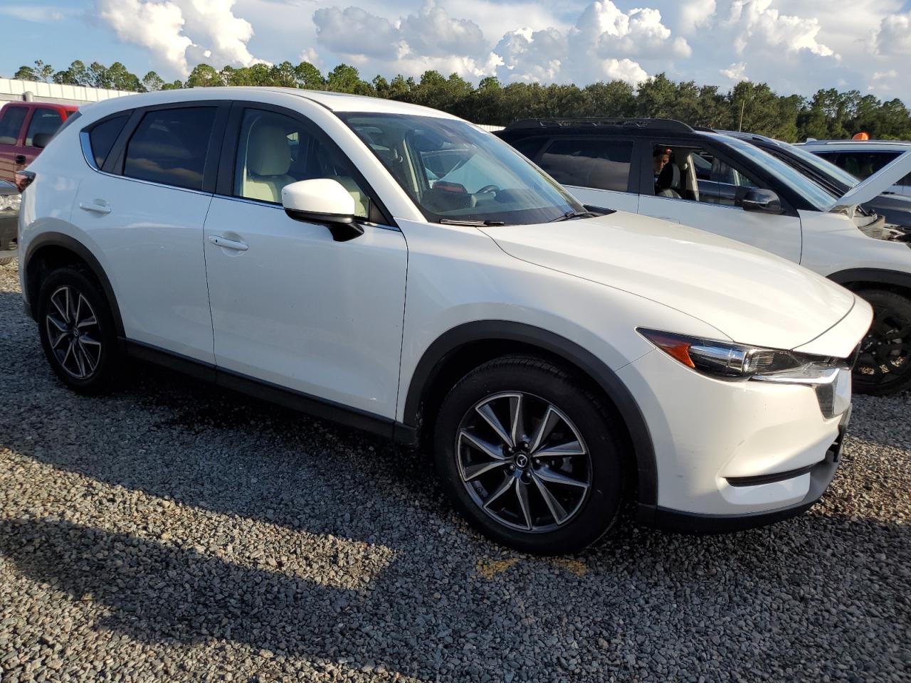 2018 Mazda CX-5 VIN JM3KFACM6J0336448 Copart auction photo, water/flood damage thumbnail 4