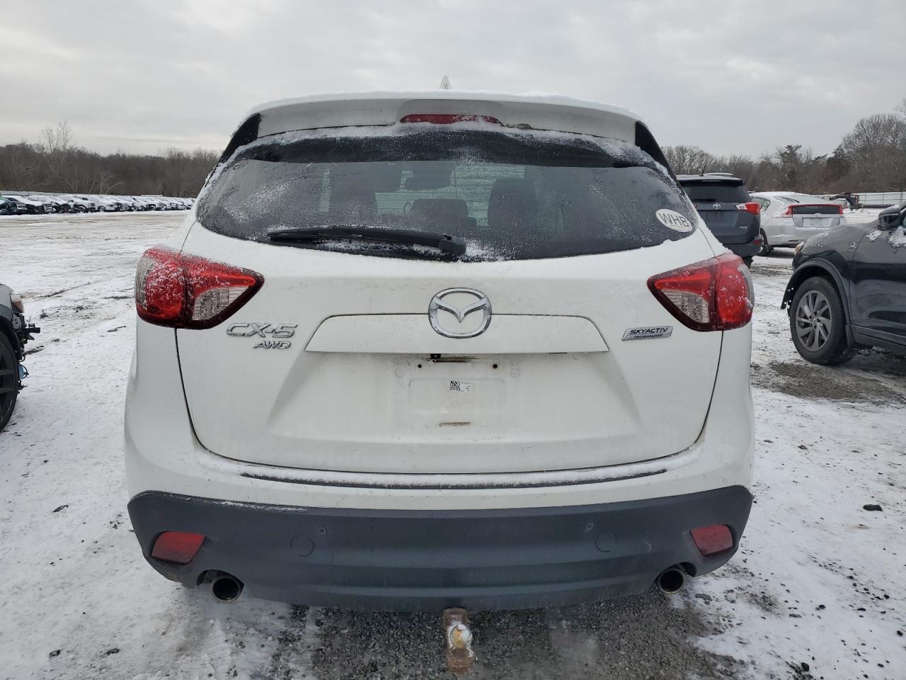 2015 Mazda CX-5 VIN JM3KE4CY3F0457579 Copart auction photo, front end / burn damage thumbnail 6