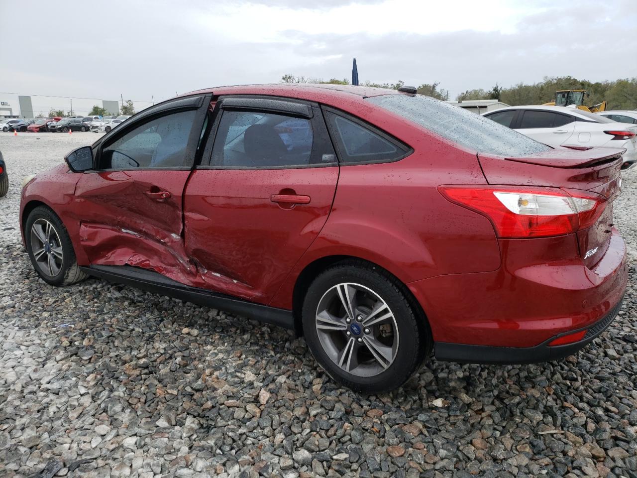 2014 Ford Focus VIN 1FADP3F2XEL403566 Copart auction photo, side / minor dent/scratches damage thumbnail 2