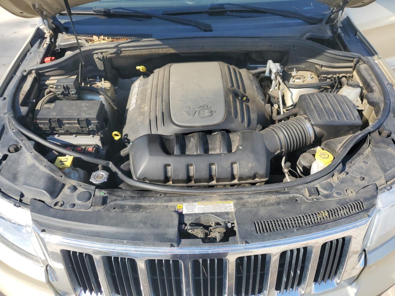 2012 Jeep Grand Cherokee VIN 1C4RJEAT6CC112234 Copart auction photo, side / minor dent/scratches damage thumbnail 11