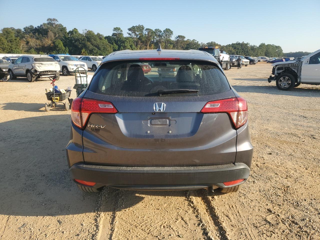 2016 Honda HR-V VIN 3CZRU5H37GM746597 Copart auction photo, side / minor dent/scratches damage thumbnail 6