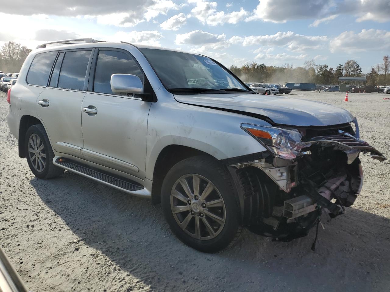 2011 Lexus LX VIN JTJHY7AX9B4076440 Copart auction photo, front end / minor dent/scratches damage thumbnail 4