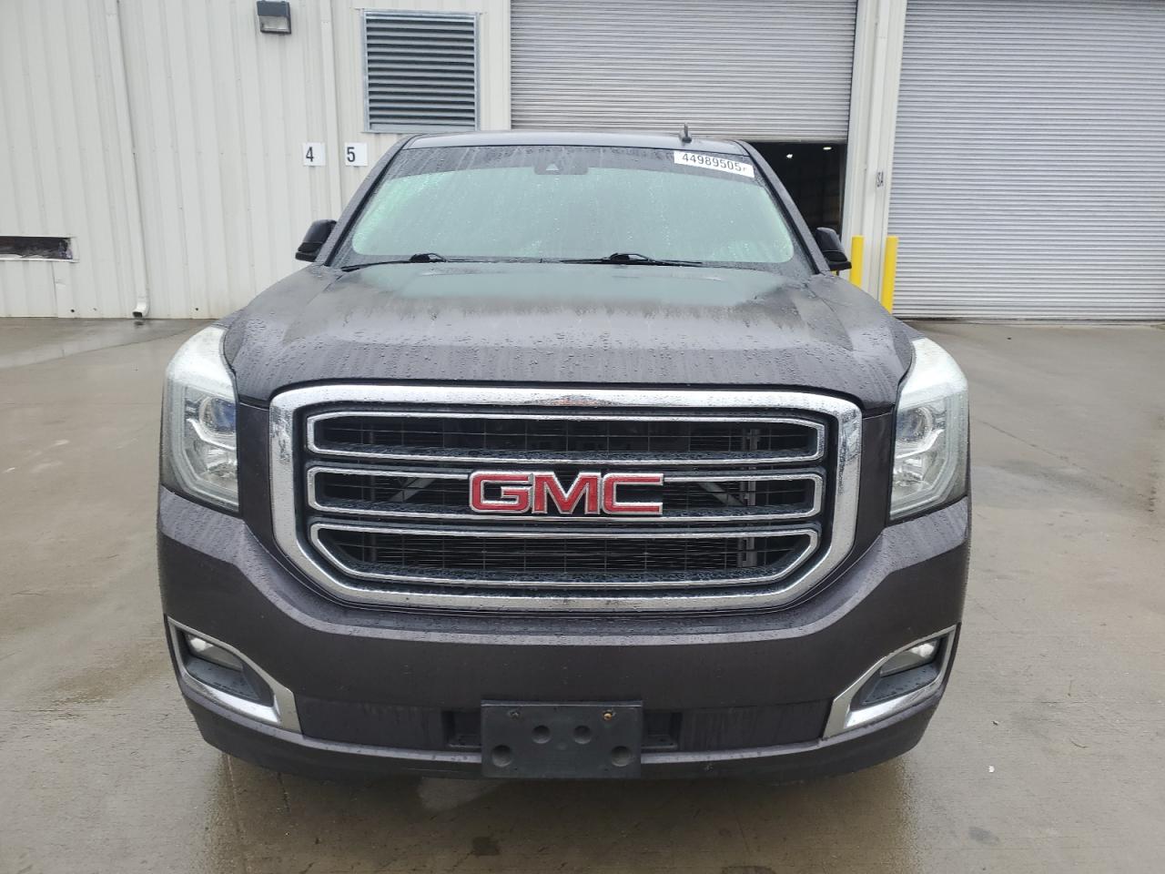 2015 GMC Yukon VIN 1GKS1BKC9FR278056 Copart auction photo, rear end damage thumbnail 5