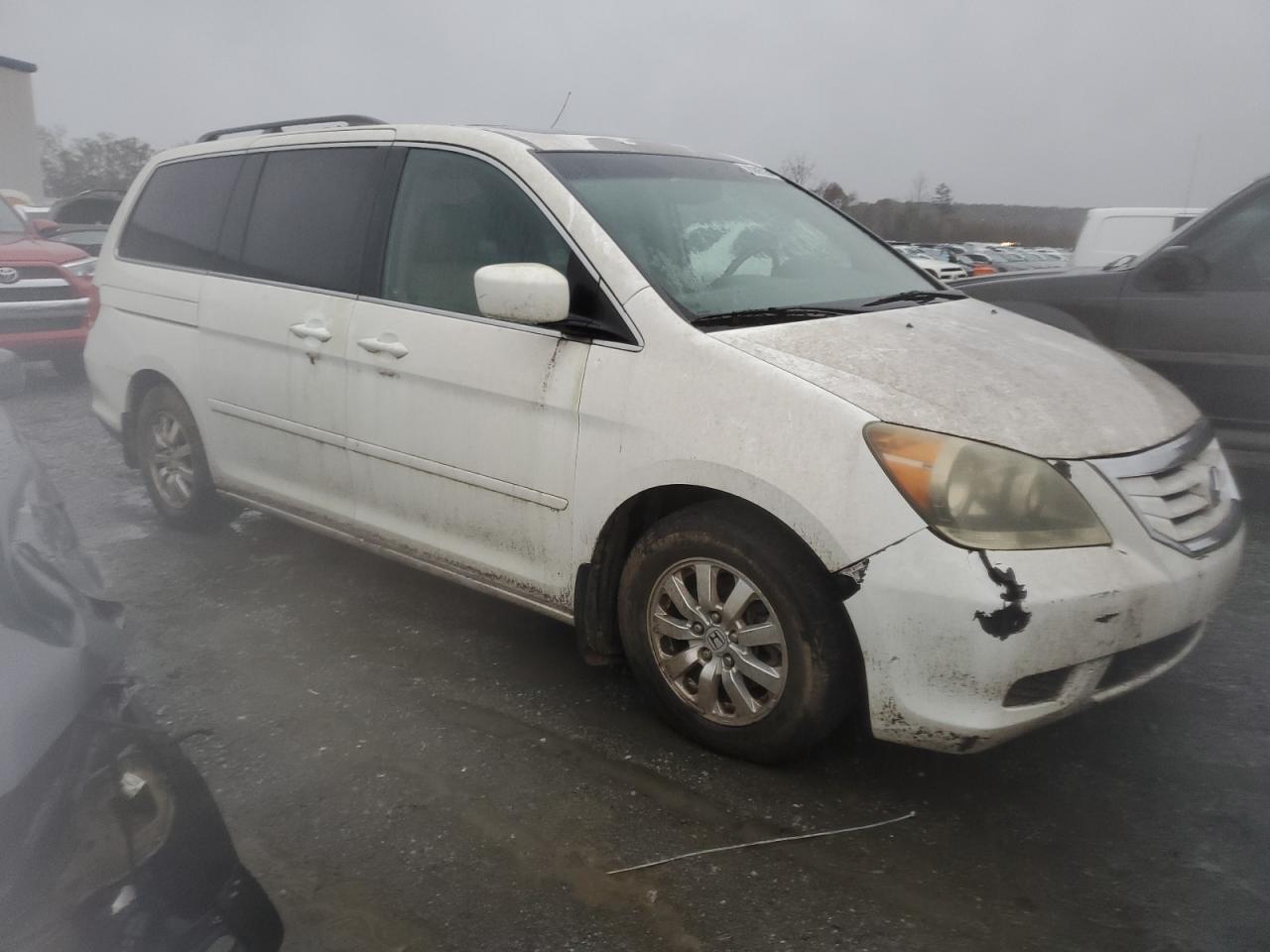 2010 Honda Odyssey VIN 5FNRL3H78AB069362 Copart auction photo, water/flood damage thumbnail 4