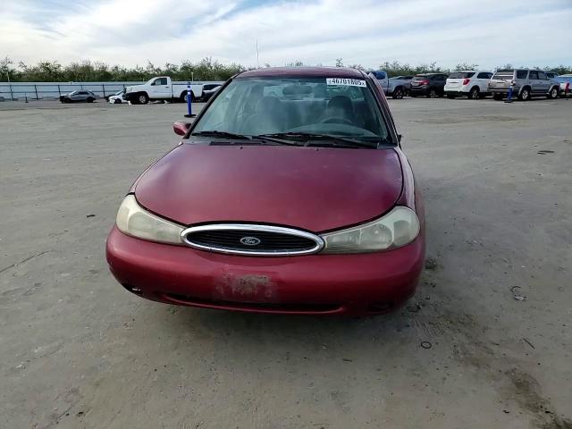 1999 Ford Contour VIN 1FAFP6633XK158685 Copart auction photo, side damage thumbnail 11