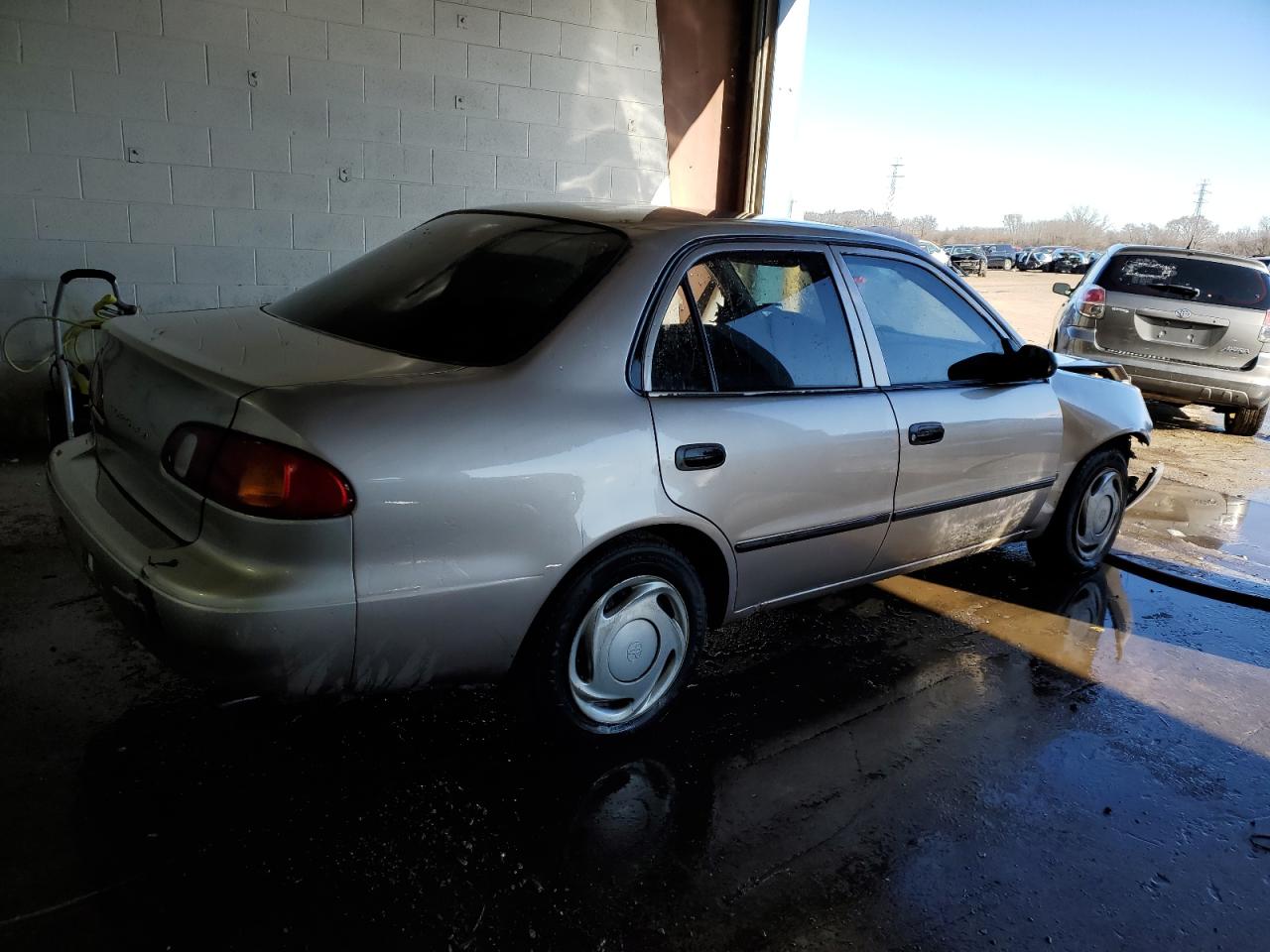 2000 Toyota Corolla VIN 1NXBR12E2YZ319171 Copart auction photo, side / all over damage thumbnail 3