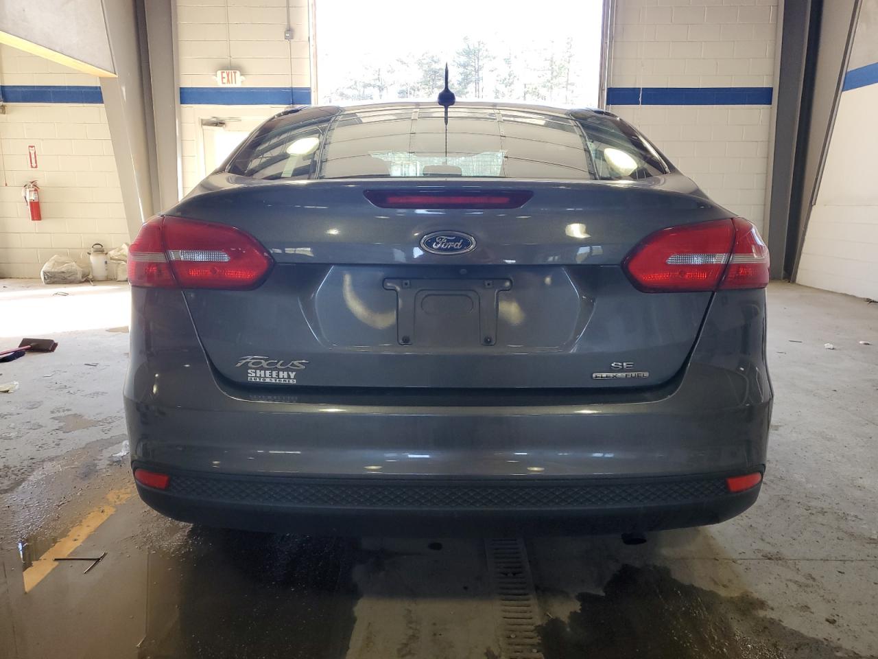 2016 Ford Focus VIN 1FADP3F26GL237033 Copart auction photo, front end / side damage thumbnail 6