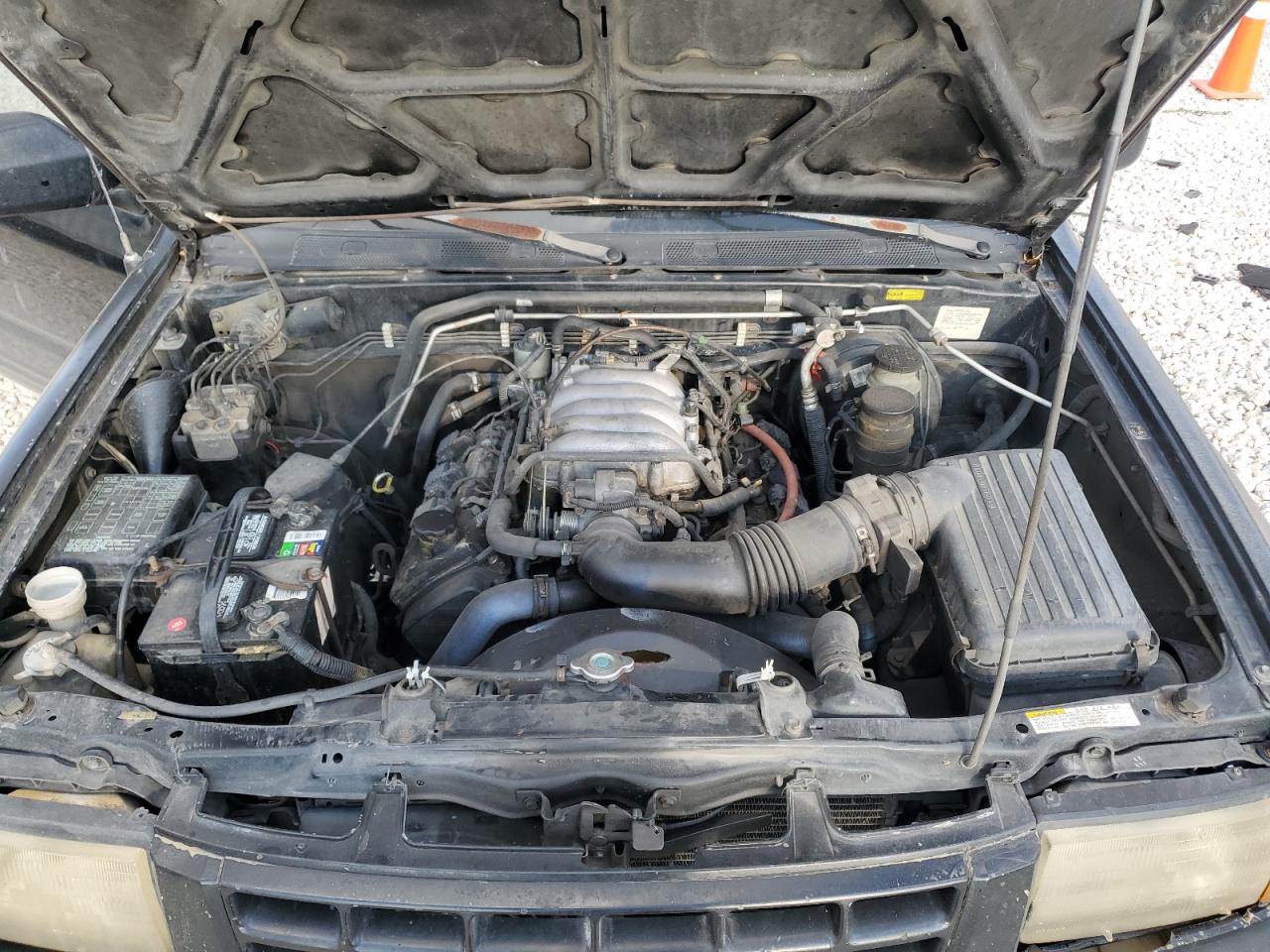1999 Isuzu Rodeo VIN 4S2CK58W3X4362974 Copart auction photo, side damage thumbnail 14