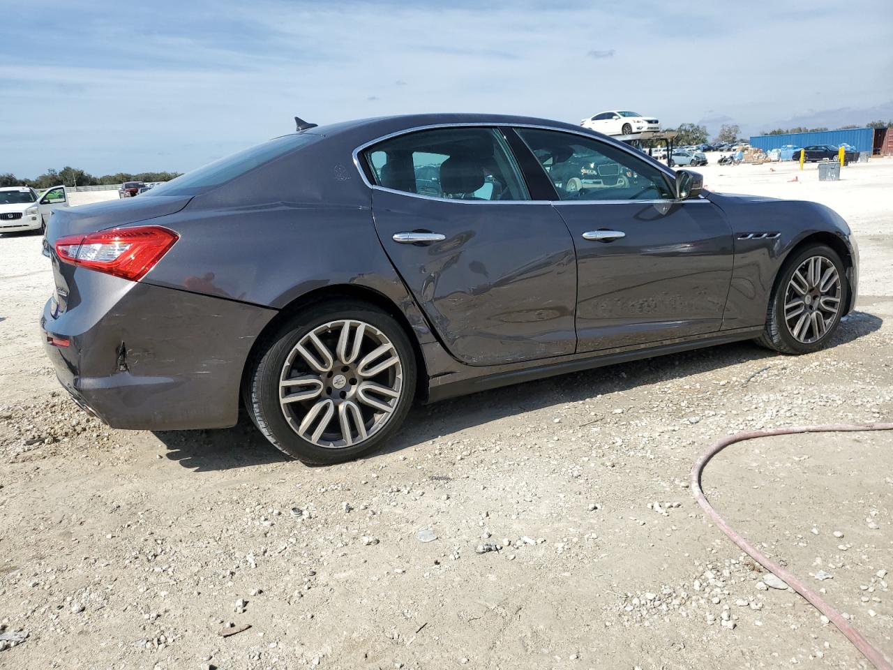 2018 Maserati Ghibli VIN ZAM57XSA2J1295187 Copart auction photo, side / rear end damage thumbnail 3