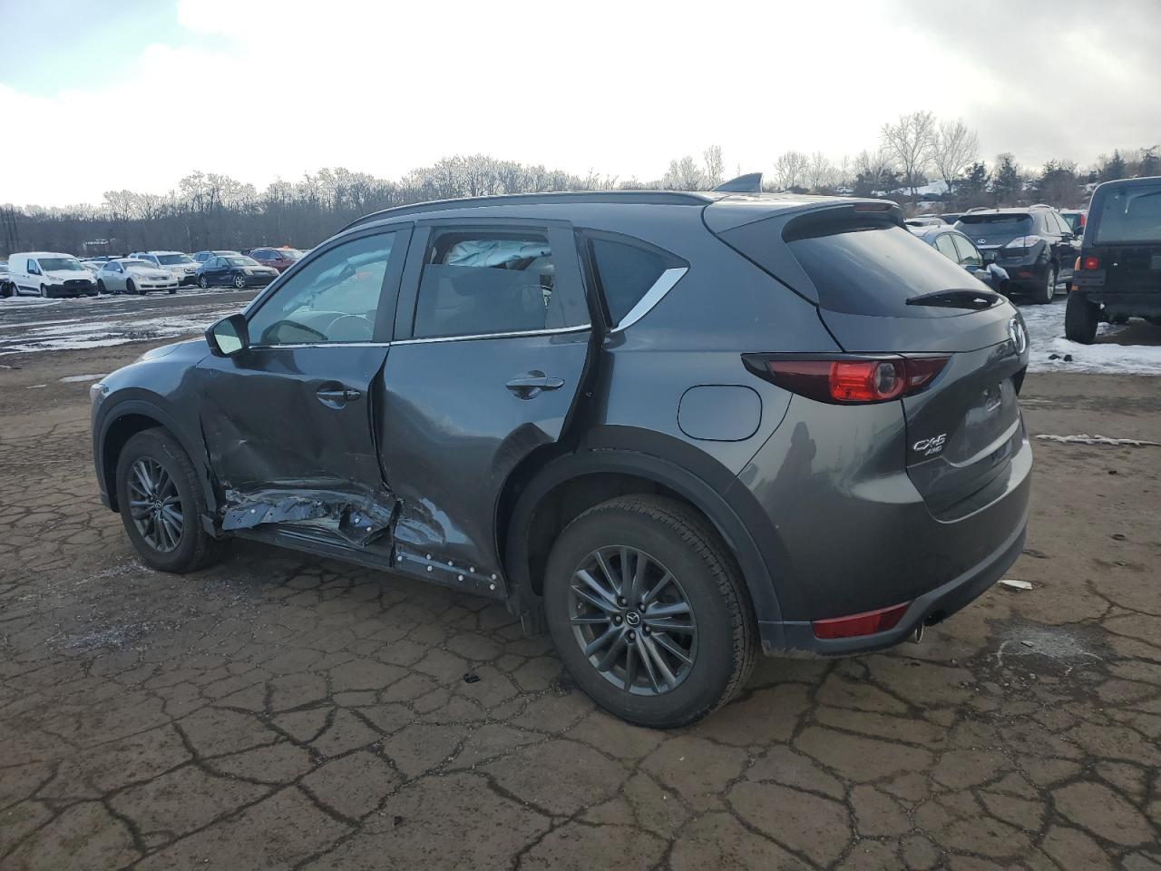 2019 Mazda CX-5 VIN JM3KFBCM4K0502652 Copart auction photo, side / rear end damage thumbnail 2