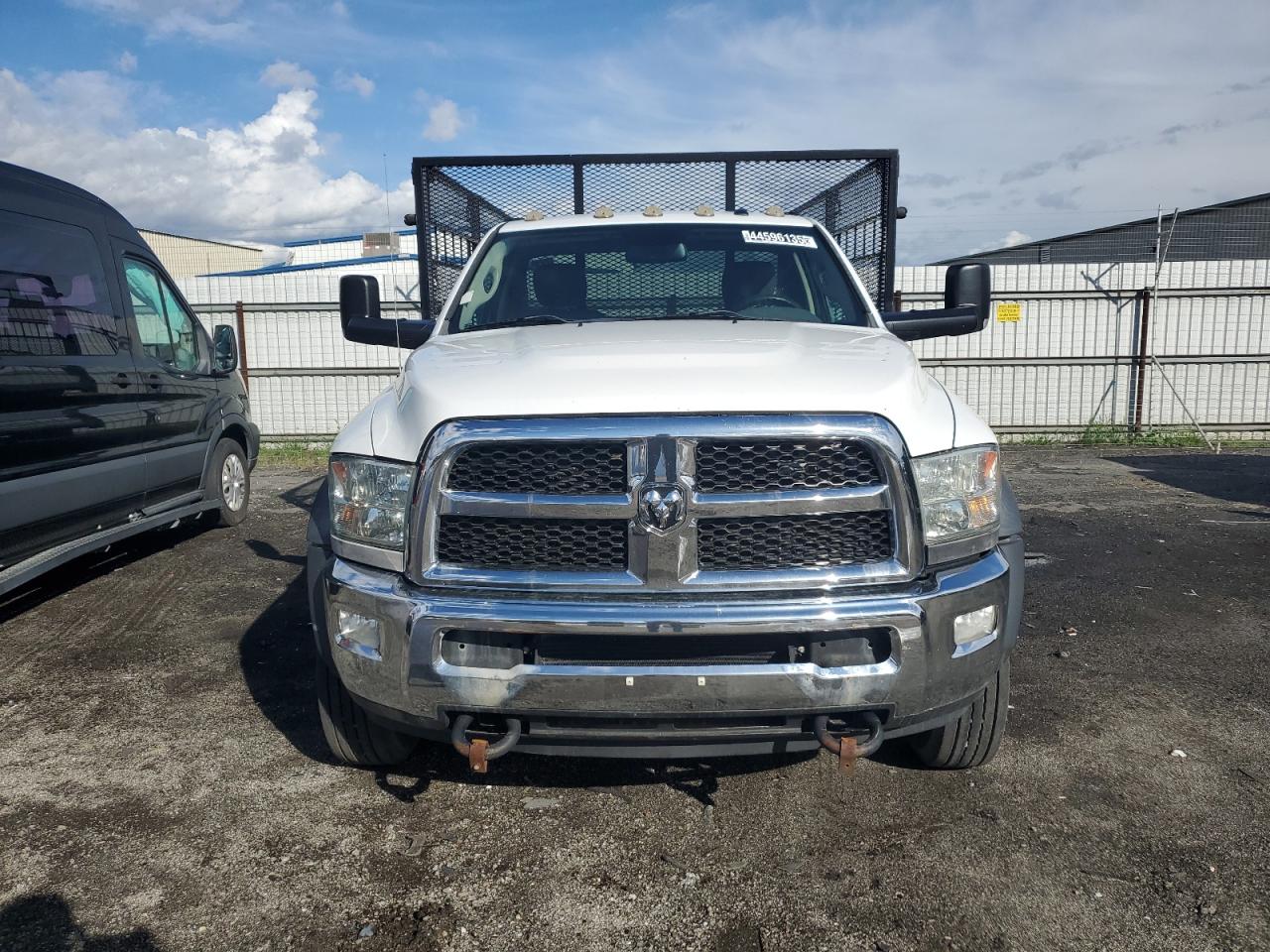 2016 RAM 5500 VIN 3C7WRMBL6GG109702 Copart auction photo, minor dent/scratches damage thumbnail 5