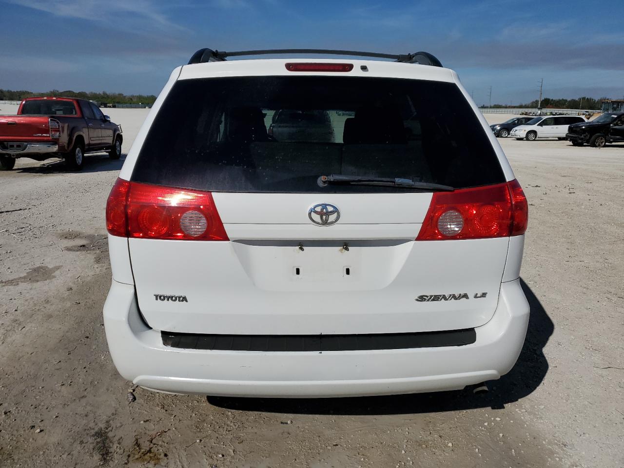 2010 Toyota Sienna VIN 5TDKK4CC5AS330117 Copart auction photo, side damage thumbnail 6