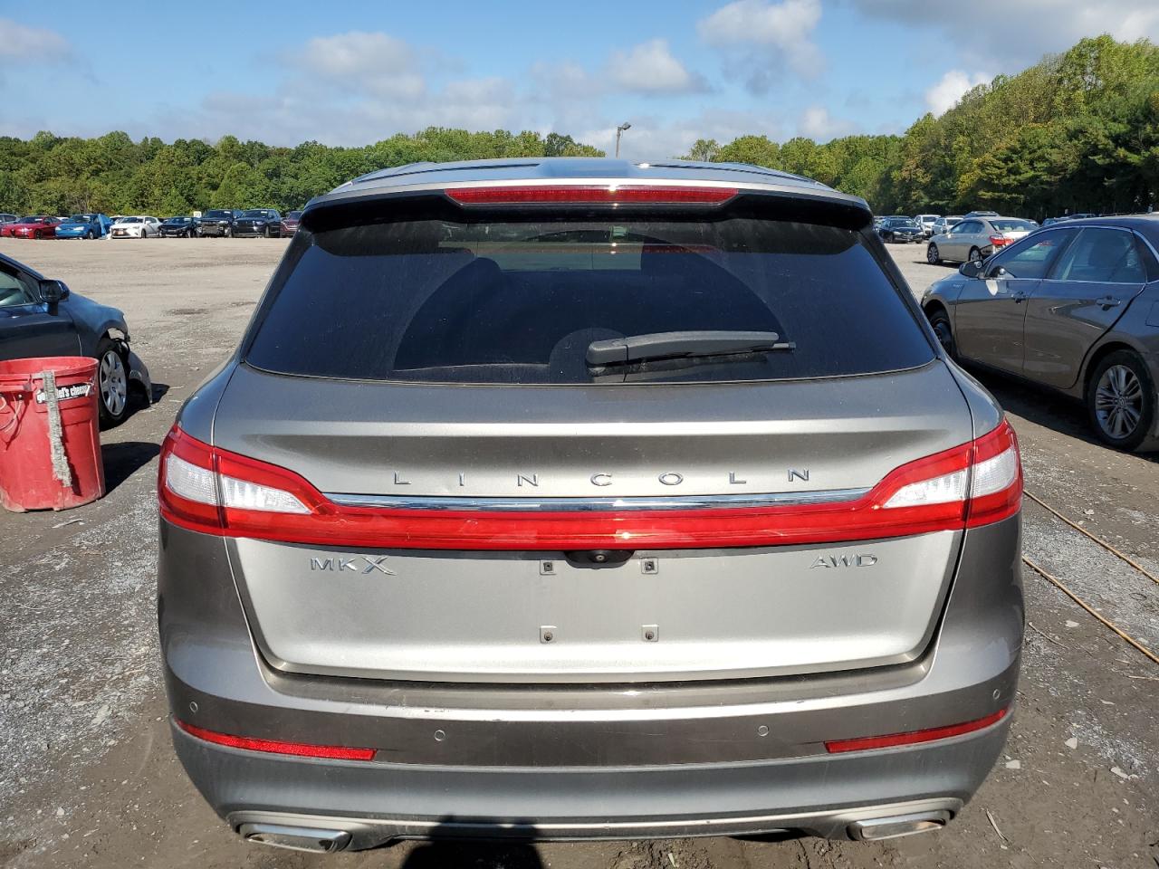 2016 Lincoln MKX VIN 2LMTJ8LR8GBL36961 Copart auction photo, side damage thumbnail 6